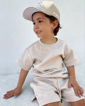 Load image into Gallery viewer, Wrapped Embossed tee